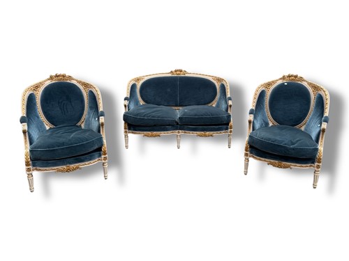 Lot 482 - A Louis XVI style white painted and parcel...