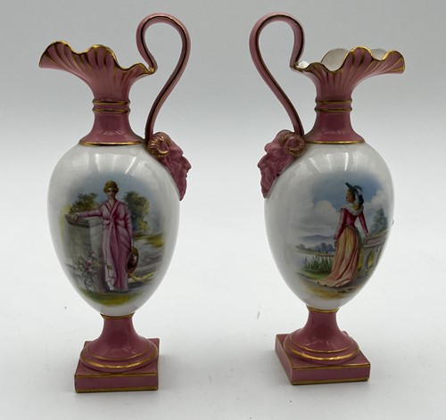 Lot 61 - A pair of Royal Worcester vases painted with...