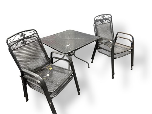 Lot 552 - A metal black painted mesh top garden table...
