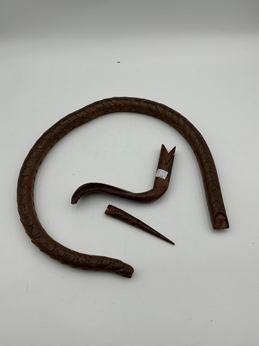 Lot 143 - An articulated wood snake