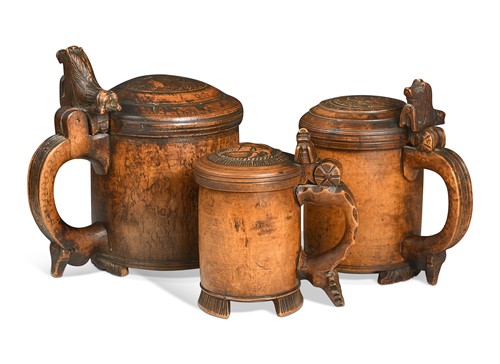Lot A group of three Norwegian birchwood peg tankards, 18th century