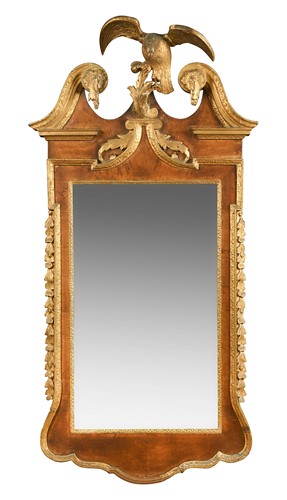 Lot 413 - A George II walnut and parcel-gilt wall mirror, circa 1740
