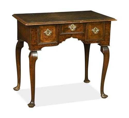 Lot 483 - A George II 'mulberry wood' lowboy