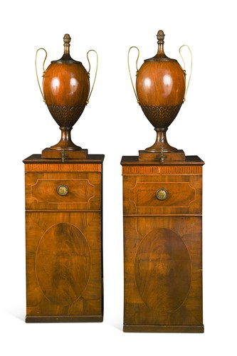 Lot A pair of George III mahogany dining room urns and pedestals