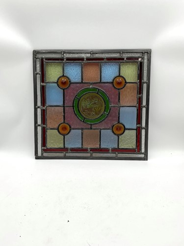 Lot 32 - An Edwardian stained glass window panel inset...