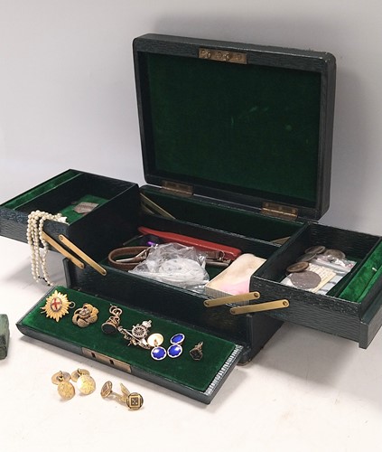 Lot 340 - A dark green leather jewellery box with bramah...