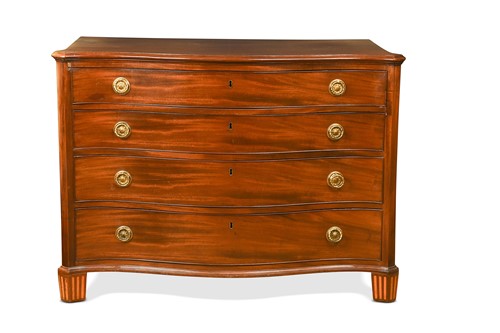 Lot 479 - A George III mahogany serpentine fronted chest of drawers