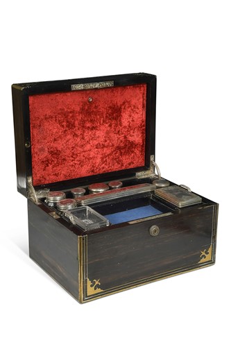 Lot 691 - A Victorian coromandel and brass-bound vanity box