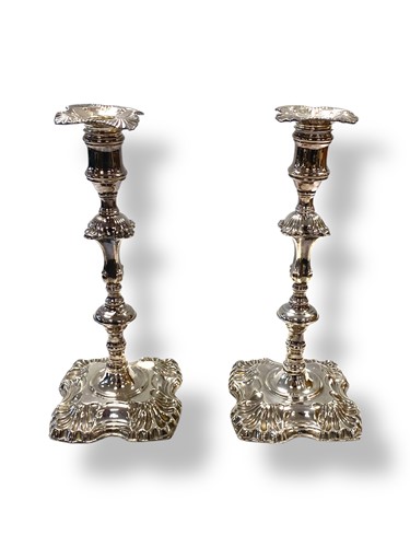 Lot 280 - A pair of silver plated candlesticks