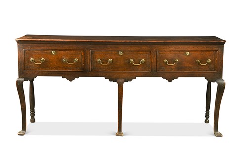 Lot 424 - An oak dresser base, 18th century