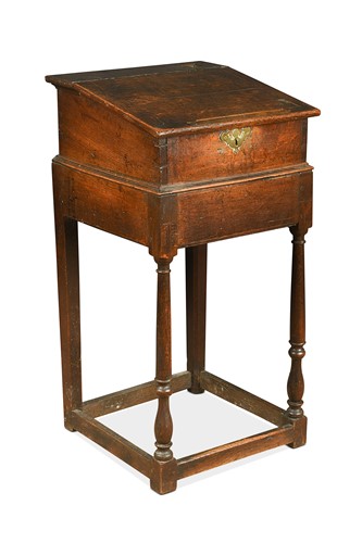 Lot 392 - A small oak slope front desk on stand, 18th century
