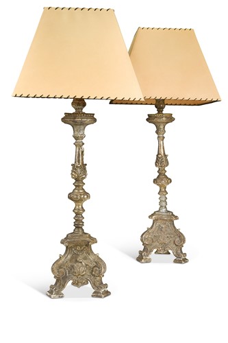 Lot 421 - A pair of silvered carved wood pricket stands converted to lamps, 19th century