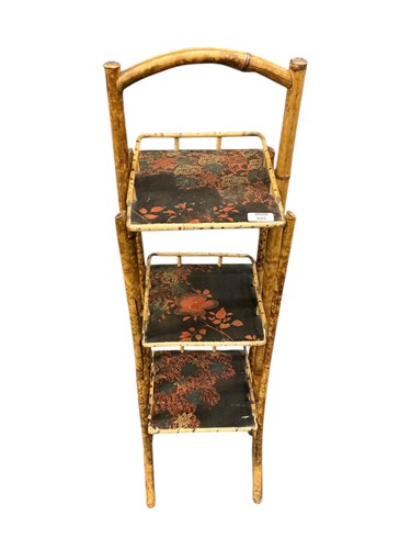 Lot 669 - A bamboo framed three tier stand, circa 1900