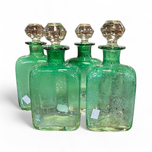 Lot 177 - Four green glass decanters with stoppers 24cm...