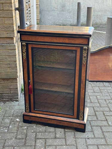 Lot 570 - A Victorian Aesthetic period ebonised and burr walnut pier cabinet