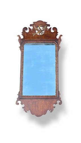 Lot 689 - A George II style walnut fret framed wall mirror