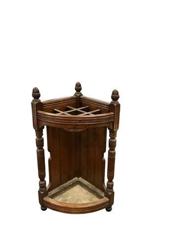 Lot 605 - An Edwardian oak stick stand with bow front...