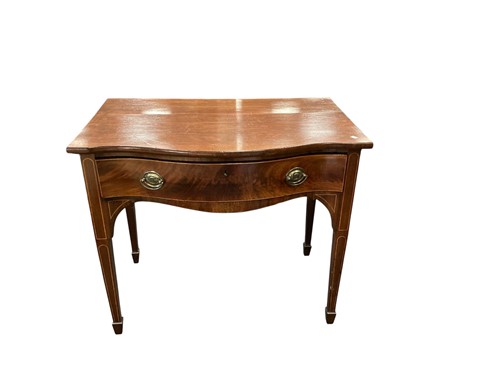 Lot 541 - A Regency mahogany serpentine side table, with...