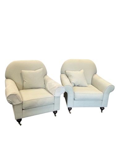 Lot 581 - A pair of Wesley-Barrell deep armchairs, with...