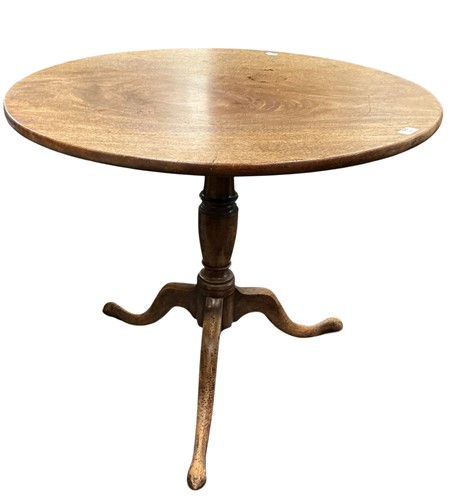 Lot 595 - A late Georgian mahogany tripod table, the...