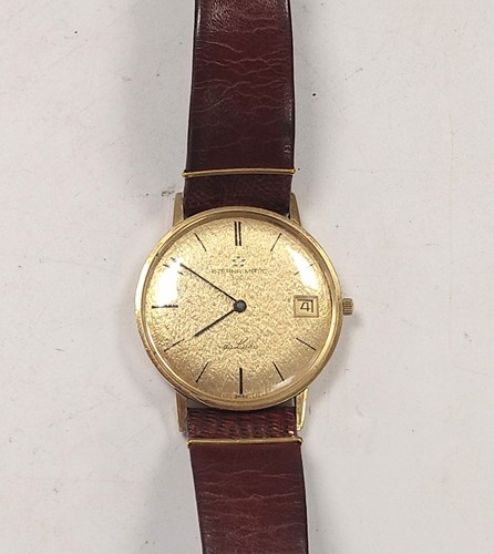 Lot 313 - Eterna Matic - A Swiss 18ct gold wristwatch,...