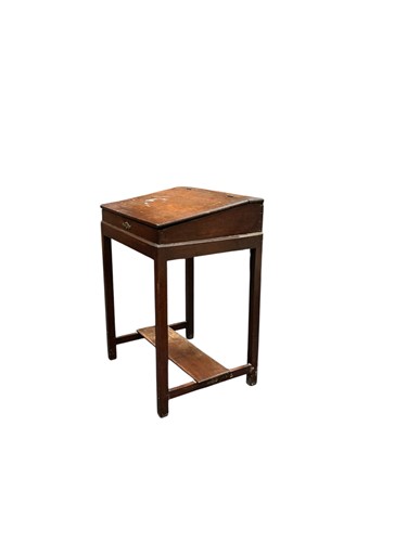 Lot 583 - A George III mahogany clerks desk, the hinged...