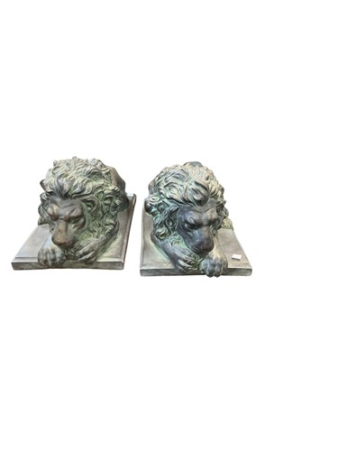 Lot 43 - A pair of bronzed terracotta models of...