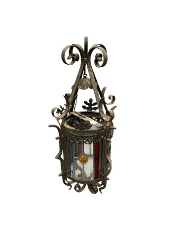 Lot 219 - A small hall lantern, black painted scrolling...