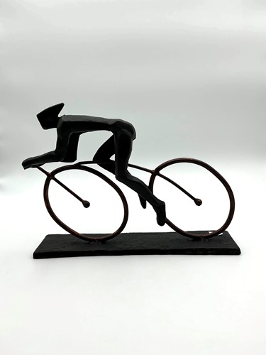 Lot 200 - A cast metal black and copper patinated...