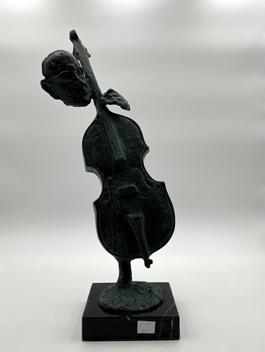 Lot 189 - A bronzed green patinated metal sculpture of a...