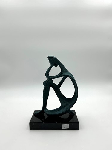 Lot 127 - A bronzed green patinated metal sculpture of a...