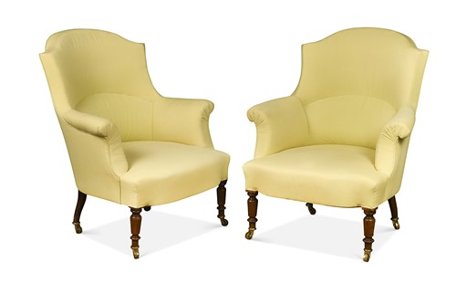 Lot 581 - A pair of yellow upholstered armchairs, 20th century