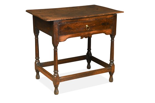 Lot 420 - A George III oak and elm lowboy
