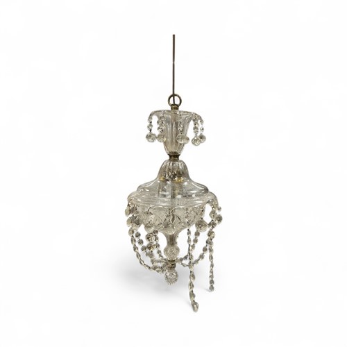 Lot 659 - A brass cut glass hanging ceiling light with...