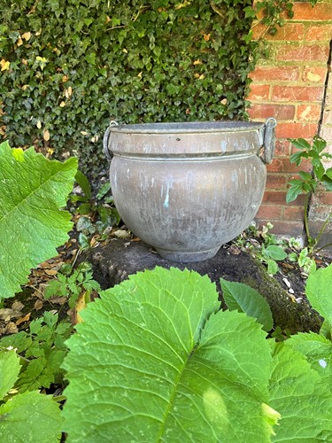 Lot 769 - A large circular brass planter, 20th century