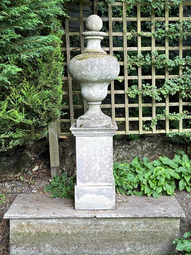 Lot 771 - A composite stone gourd shaped urn and plinth, modern