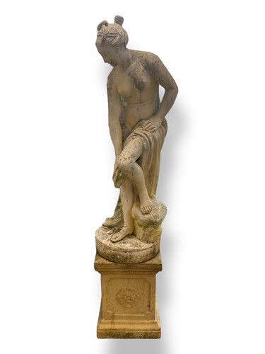 Lot 711 - A composite stone figure of Venus, integral...