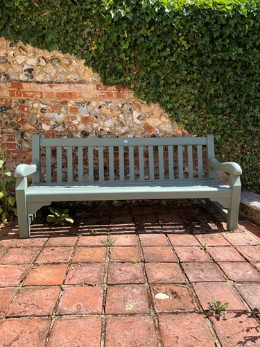 Lot 772 - A green painted teak garden seat, 20th century