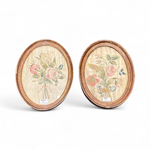 Lot 193 - A pair of needlepoint pictures of roses