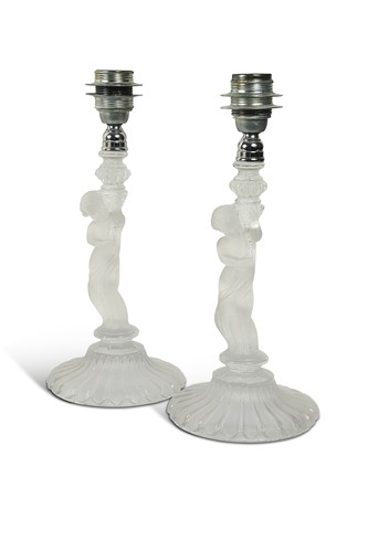 Lot 672 - A pair of Baccarat table lamps, 20th century
