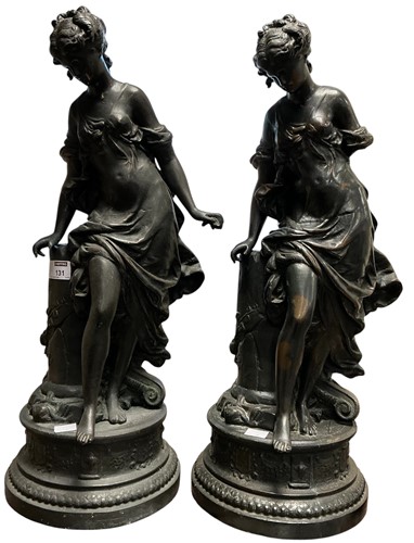 Lot 131 - Two cast metal figures, possibly spelter...