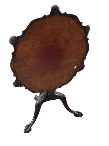 Lot 604 - A George III style mahogany pie-crust tripod...