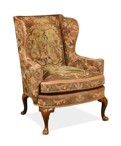 Lot 429 - A Queen Anne style walnut wingback armchair