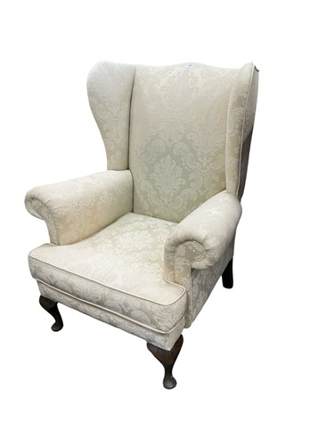 Lot 504 - A George III style wingback armchair 100.5 x...
