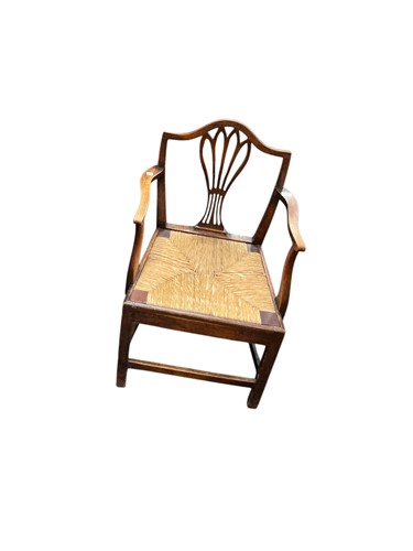 Lot 473 - A George III mahogany astragal corner cupboard,...