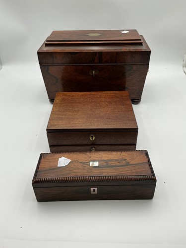 Lot 215 - A Regency rosewood tea caddy, of sarcophagus...