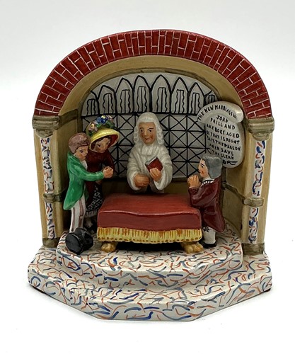 Lot 18 - A Staffordshire pearlware figural group 'The...