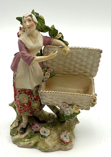Lot 57 - A Chelsea sweetmeat figure, late 18th century,...