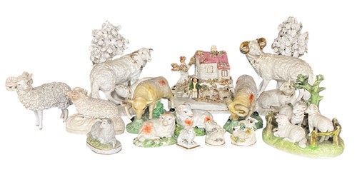 Lot 27 - A pair of Derby porcelain sheep with lambs in...