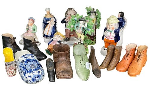 Lot 55 - Various wooden and ceramic model shoes and...